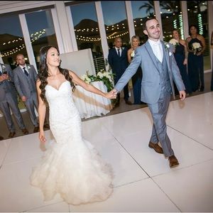 My wedding dress I had cleaned and preserved. This is a size 2/4 and I am 5’0